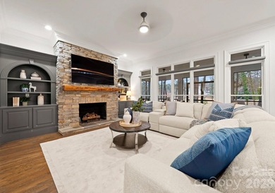 Set on a level one-acre lot on the 5th hole of Trump National on Trump National Golf Club Charlotte in North Carolina - for sale on GolfHomes.com, golf home, golf lot