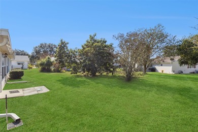 One or more photo(s) has been virtually staged. This inviting on The Links of Spruce Creek in Florida - for sale on GolfHomes.com, golf home, golf lot