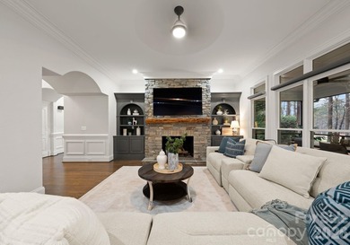 Set on a level one-acre lot on the 5th hole of Trump National on Trump National Golf Club Charlotte in North Carolina - for sale on GolfHomes.com, golf home, golf lot