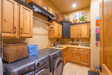 Experience luxury living in this beautiful single-level custom on  in Utah - for sale on GolfHomes.com, golf home, golf lot