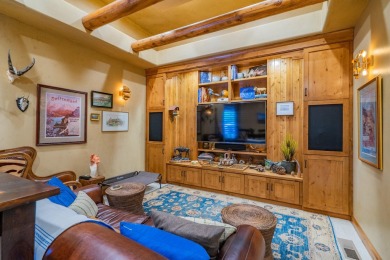 Experience luxury living in this beautiful single-level custom on Entrada at Snow Canyon in Utah - for sale on GolfHomes.com, golf home, golf lot