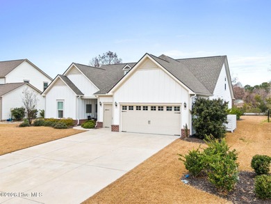 Experience the perfect blend of luxury, privacy, and coastal on Crow Creek Golf Club in North Carolina - for sale on GolfHomes.com, golf home, golf lot