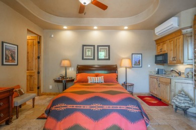 Experience luxury living in this beautiful single-level custom on Entrada at Snow Canyon in Utah - for sale on GolfHomes.com, golf home, golf lot