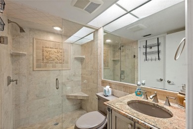Relaxing is easy from this ideally located golf course condo in on Isla Del Sol Yacht and Country Club in Florida - for sale on GolfHomes.com, golf home, golf lot