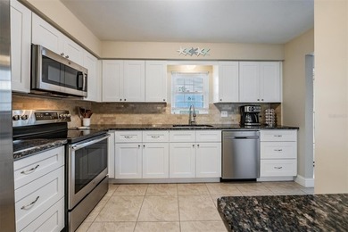 Belleair's Mid-Century Gem! Recently remodeled 2BR/2BA condo in on Belleview Biltmore Golf Club in Florida - for sale on GolfHomes.com, golf home, golf lot