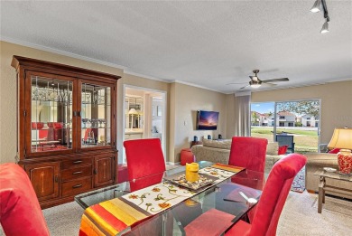 Relaxing is easy from this ideally located golf course condo in on Isla Del Sol Yacht and Country Club in Florida - for sale on GolfHomes.com, golf home, golf lot