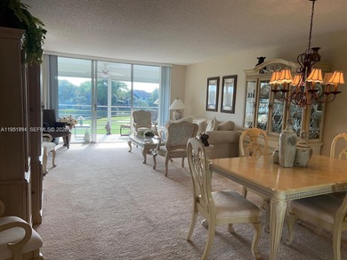 Prime corner 3BD/2BA residence featuring one of the largest on Palm-Aire Country Club and Resort - The Oaks in Florida - for sale on GolfHomes.com, golf home, golf lot