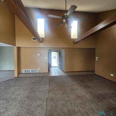 This home sits on a large corner lot in Colonial Park. Close on Chaparral Country Club in New Mexico - for sale on GolfHomes.com, golf home, golf lot