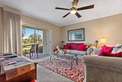 Relaxing is easy from this ideally located golf course condo in on Isla Del Sol Yacht and Country Club in Florida - for sale on GolfHomes.com, golf home, golf lot