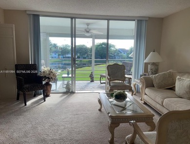 Prime corner 3BD/2BA residence featuring one of the largest on Palm-Aire Country Club and Resort - The Oaks in Florida - for sale on GolfHomes.com, golf home, golf lot