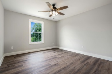 This beautiful home offers a relaxed and stylish lifestyle in a on Russellville Country Club in Kentucky - for sale on GolfHomes.com, golf home, golf lot
