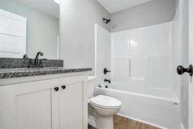 This beautiful home offers a relaxed and stylish lifestyle in a on Russellville Country Club in Kentucky - for sale on GolfHomes.com, golf home, golf lot