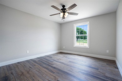 This beautiful home offers a relaxed and stylish lifestyle in a on Russellville Country Club in Kentucky - for sale on GolfHomes.com, golf home, golf lot