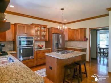 Welcome to this beautiful 4 bedroom, 4 bathroom gem nestled in on Carrington Golf Club in Michigan - for sale on GolfHomes.com, golf home, golf lot