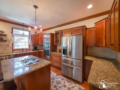 Welcome to this beautiful 4 bedroom, 4 bathroom gem nestled in on Carrington Golf Club in Michigan - for sale on GolfHomes.com, golf home, golf lot