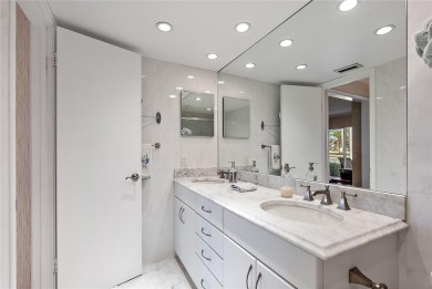 Relaxing is easy from this ideally located golf course condo in on Isla Del Sol Yacht and Country Club in Florida - for sale on GolfHomes.com, golf home, golf lot