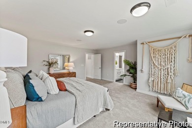 This semi-custom home in Lake Royale offers 3BR/2.5BA and Quick on River Golf and Country Club at Lake Royale in North Carolina - for sale on GolfHomes.com, golf home, golf lot