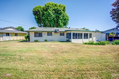 Beautiful Kern City home loaded with updates and on the Sundale on Sundale Country Club in California - for sale on GolfHomes.com, golf home, golf lot
