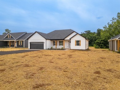 This beautiful home offers a relaxed and stylish lifestyle in a on Russellville Country Club in Kentucky - for sale on GolfHomes.com, golf home, golf lot