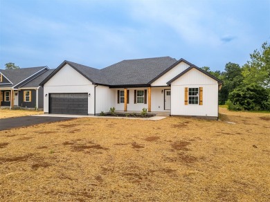 This beautiful home offers a relaxed and stylish lifestyle in a on Russellville Country Club in Kentucky - for sale on GolfHomes.com, golf home, golf lot