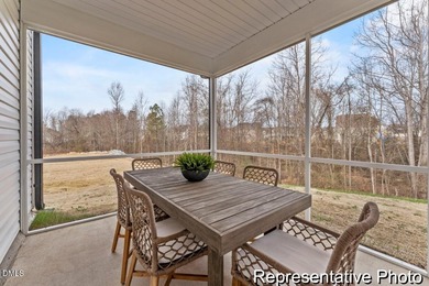 This semi-custom home in Lake Royale offers 3BR/2.5BA and Quick on River Golf and Country Club at Lake Royale in North Carolina - for sale on GolfHomes.com, golf home, golf lot