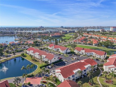 Relaxing is easy from this ideally located golf course condo in on Isla Del Sol Yacht and Country Club in Florida - for sale on GolfHomes.com, golf home, golf lot