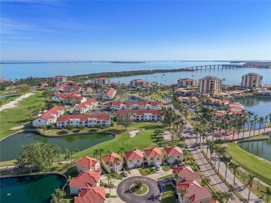 Relaxing is easy from this ideally located golf course condo in on Isla Del Sol Yacht and Country Club in Florida - for sale on GolfHomes.com, golf home, golf lot