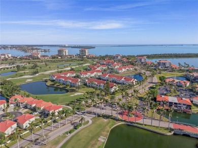 Relaxing is easy from this ideally located golf course condo in on Isla Del Sol Yacht and Country Club in Florida - for sale on GolfHomes.com, golf home, golf lot