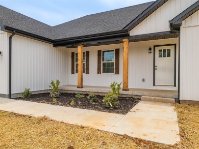 This beautiful home offers a relaxed and stylish lifestyle in a on Russellville Country Club in Kentucky - for sale on GolfHomes.com, golf home, golf lot