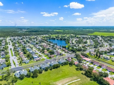 Welcome to this beautifully maintained 3-bedroom, 2.5-bath on Wedgefield Golf Club in Florida - for sale on GolfHomes.com, golf home, golf lot
