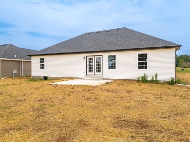 This beautiful home offers a relaxed and stylish lifestyle in a on Russellville Country Club in Kentucky - for sale on GolfHomes.com, golf home, golf lot