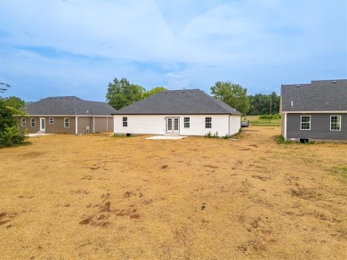 This beautiful home offers a relaxed and stylish lifestyle in a on Russellville Country Club in Kentucky - for sale on GolfHomes.com, golf home, golf lot