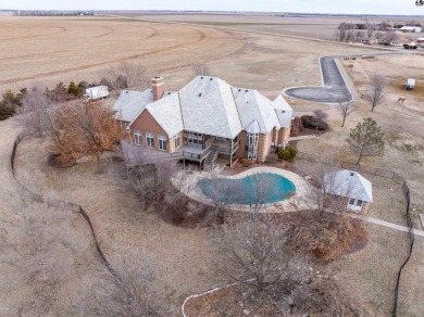 This exquisite custom-built estate sits on 9 acres and also has on The Links at Pretty Prairie in Kansas - for sale on GolfHomes.com, golf home, golf lot