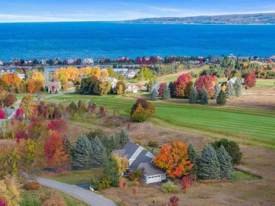 Welcome to this exquisite 4-bedroom, 4-bath home nestled in the on Crooked Tree Golf Club in Michigan - for sale on GolfHomes.com, golf home, golf lot