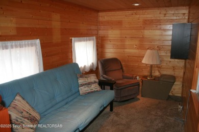 Spacious 1998 nomad park model, 584 square feet. Large living on Star Valley RV Golf Course in Wyoming - for sale on GolfHomes.com, golf home, golf lot