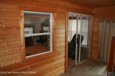 Spacious 1998 nomad park model, 584 square feet. Large living on Star Valley RV Golf Course in Wyoming - for sale on GolfHomes.com, golf home, golf lot