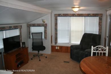 Spacious 1998 nomad park model, 584 square feet. Large living on Star Valley RV Golf Course in Wyoming - for sale on GolfHomes.com, golf home, golf lot