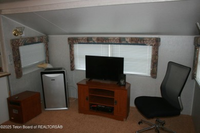 Spacious 1998 nomad park model, 584 square feet. Large living on Star Valley RV Golf Course in Wyoming - for sale on GolfHomes.com, golf home, golf lot
