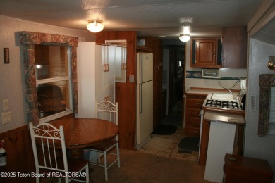 Spacious 1998 nomad park model, 584 square feet. Large living on Star Valley RV Golf Course in Wyoming - for sale on GolfHomes.com, golf home, golf lot