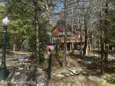 Large Chalet home in the Hideout, house features 4-bedrooms, 3 on The Hideout Golf in Pennsylvania - for sale on GolfHomes.com, golf home, golf lot