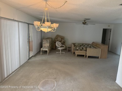 SPACIOUS & PRICED TO SELL 2/2/2 TIMBER PINES HOME ON CORNER LOT on Timber Pines Golf Course in Florida - for sale on GolfHomes.com, golf home, golf lot