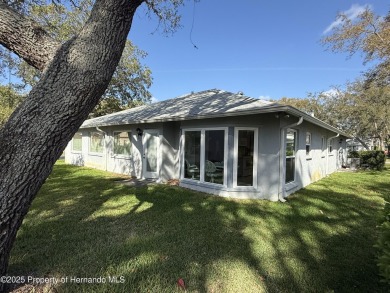 SPACIOUS & PRICED TO SELL 2/2/2 TIMBER PINES HOME ON CORNER LOT on Timber Pines Golf Course in Florida - for sale on GolfHomes.com, golf home, golf lot