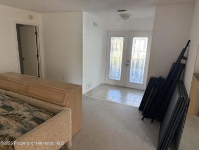 SPACIOUS & PRICED TO SELL 2/2/2 TIMBER PINES HOME ON CORNER LOT on Timber Pines Golf Course in Florida - for sale on GolfHomes.com, golf home, golf lot