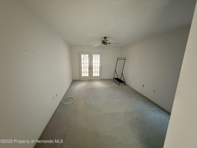 SPACIOUS & PRICED TO SELL 2/2/2 TIMBER PINES HOME ON CORNER LOT on Timber Pines Golf Course in Florida - for sale on GolfHomes.com, golf home, golf lot