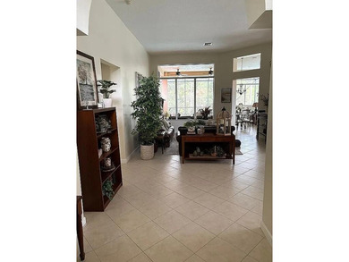 This exceptionally clean home features a newer 2023 heated on The Legacy Golf and Tennis Club in Florida - for sale on GolfHomes.com, golf home, golf lot