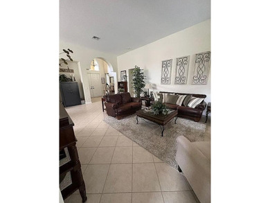 This exceptionally clean home features a newer 2023 heated on The Legacy Golf and Tennis Club in Florida - for sale on GolfHomes.com, golf home, golf lot