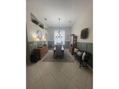 This exceptionally clean home features a newer 2023 heated on The Legacy Golf and Tennis Club in Florida - for sale on GolfHomes.com, golf home, golf lot