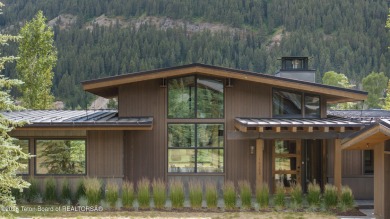 Experience mountain modern luxury in this stunning one-level, 4 on Snake River Sporting Club in Wyoming - for sale on GolfHomes.com, golf home, golf lot