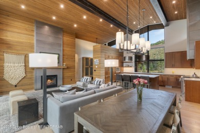 Experience mountain modern luxury in this stunning one-level, 4 on Snake River Sporting Club in Wyoming - for sale on GolfHomes.com, golf home, golf lot