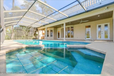 NEW PRICE! Stunning riverfront estate-style pool home in the on Aquarina Beach and Country Club in Florida - for sale on GolfHomes.com, golf home, golf lot